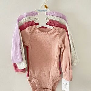 8 Baby Long-sleeve Bodysuits - 2 4-packs